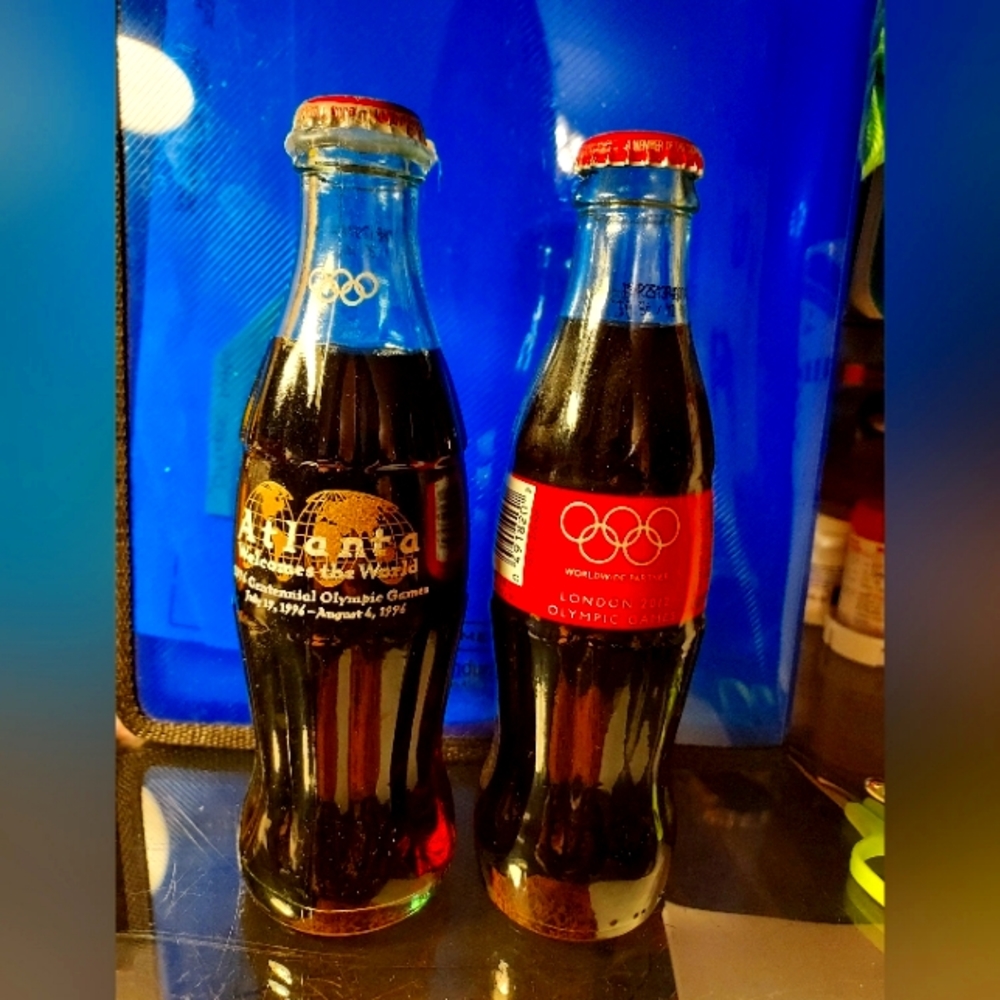 6oz full Coke bottles